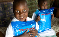 Children receive bed nets