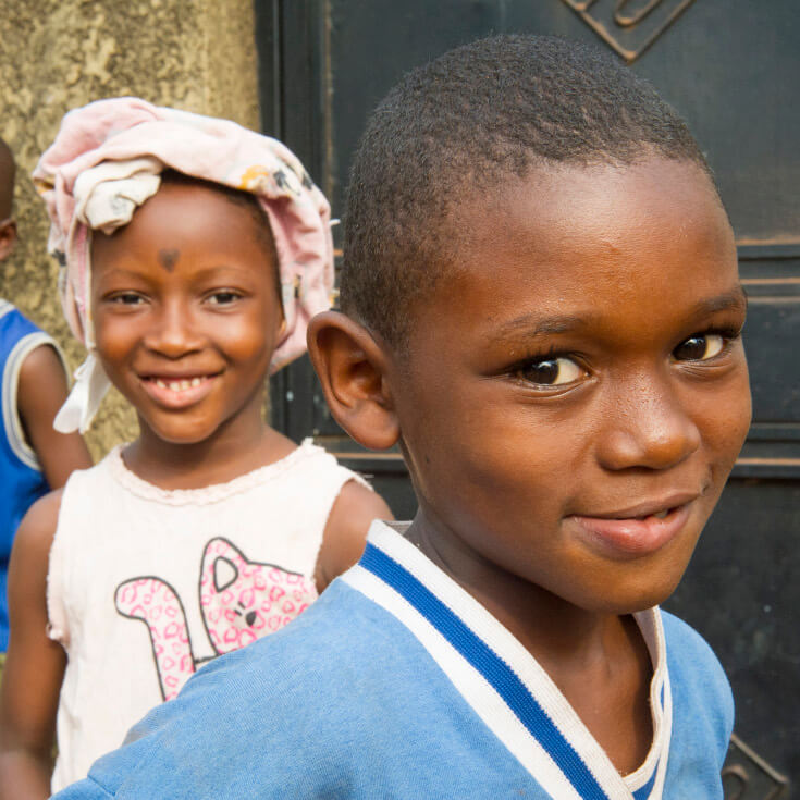 Two children smiling