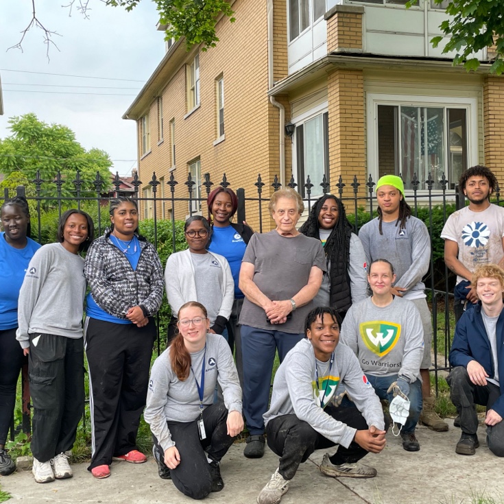 A group of volunteers posing for a picture