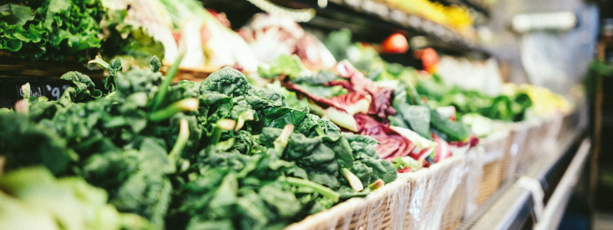 Vegetables in a grocery store produce section