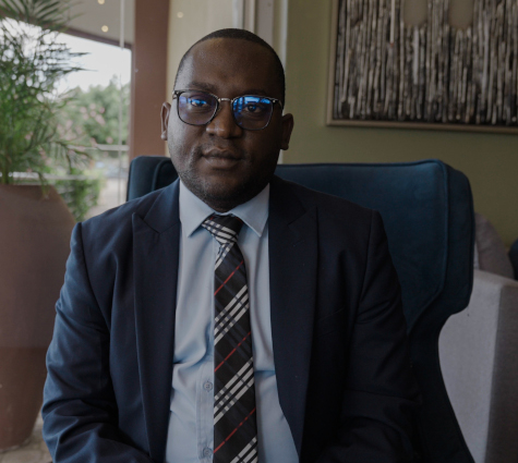 Saviour Moyo seated in an office