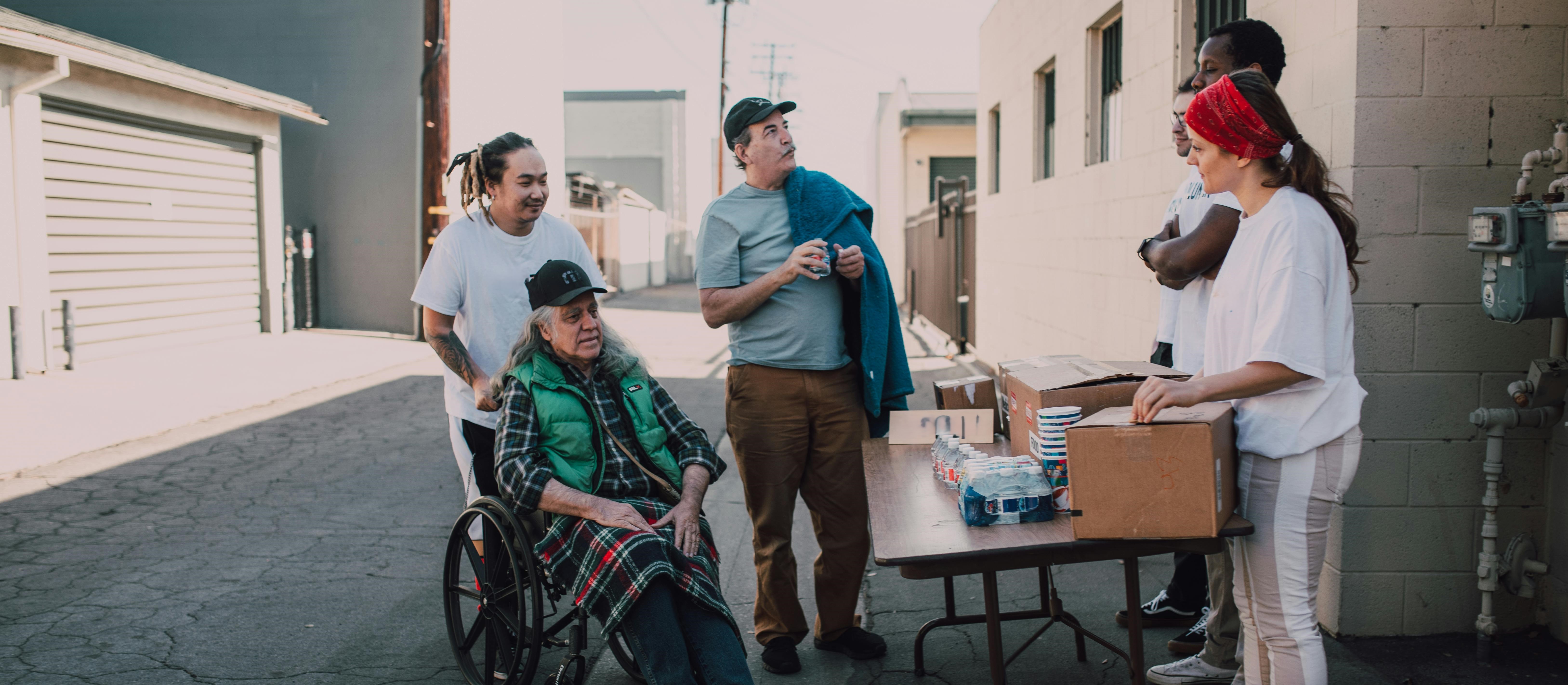 Community members using overdose prevention and response tools