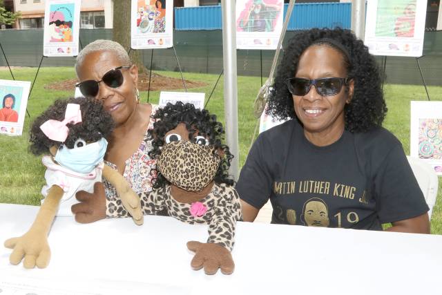 Darlene Savage and Patricia Bernard with their puppets
