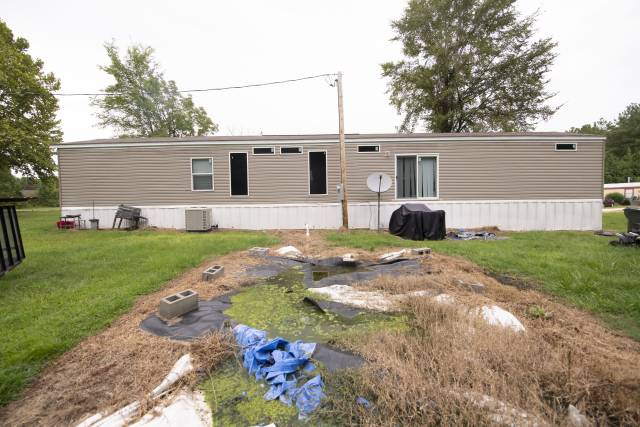 Backyard of a home in Alabama with sewage