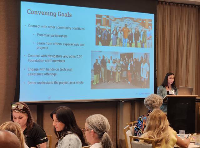 A speaker at a podium