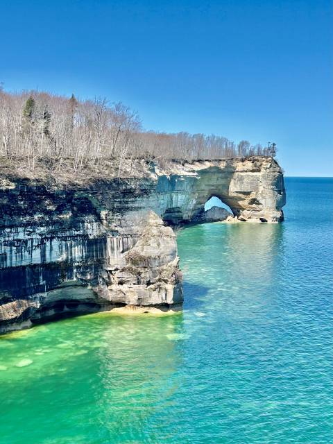 Huge cliffs over clear water in Lake Superior