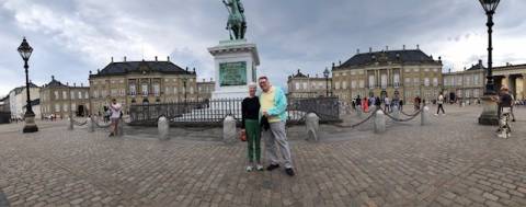Kathy and Alan Bremer Pose in front of Statue while Traveling